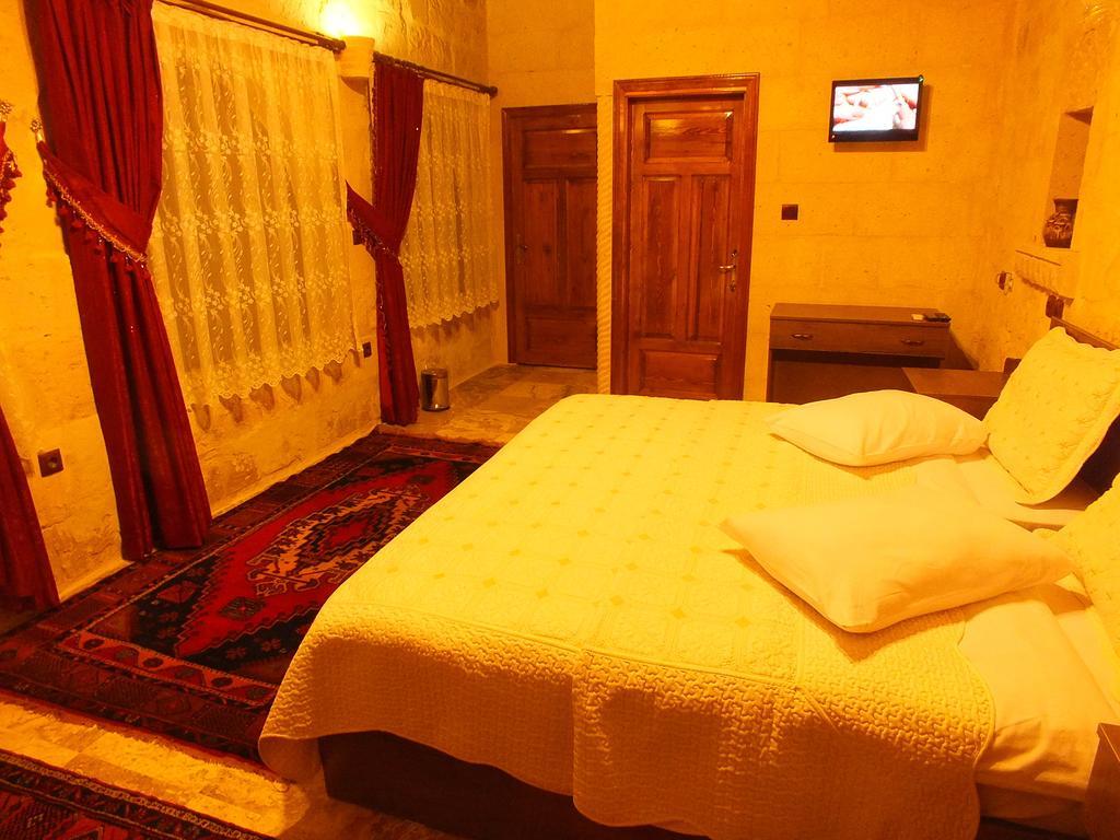 Dilek Tepesi Cave Hotel Ayvali Quarto foto