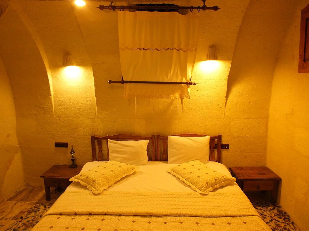 Dilek Tepesi Cave Hotel Ayvali Quarto foto